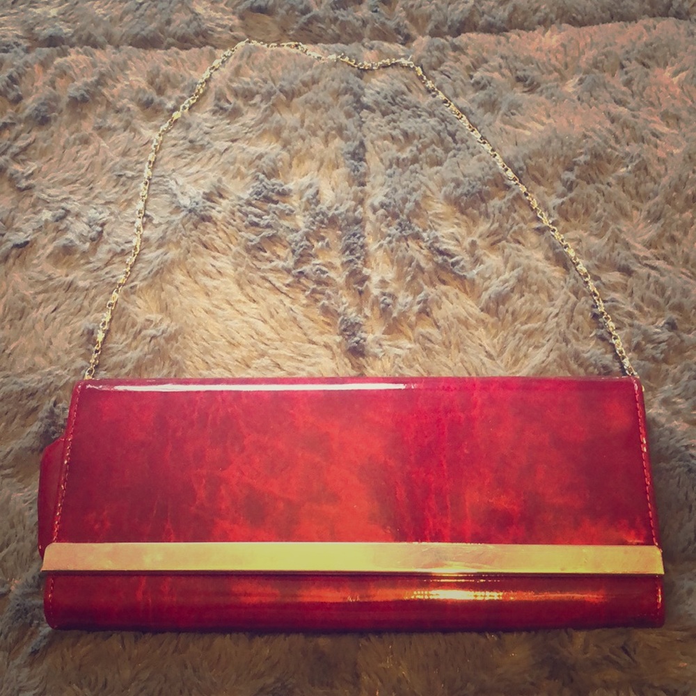 Bright red clutch wristlet